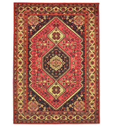 Red antique rug with ornate vintage patterns.